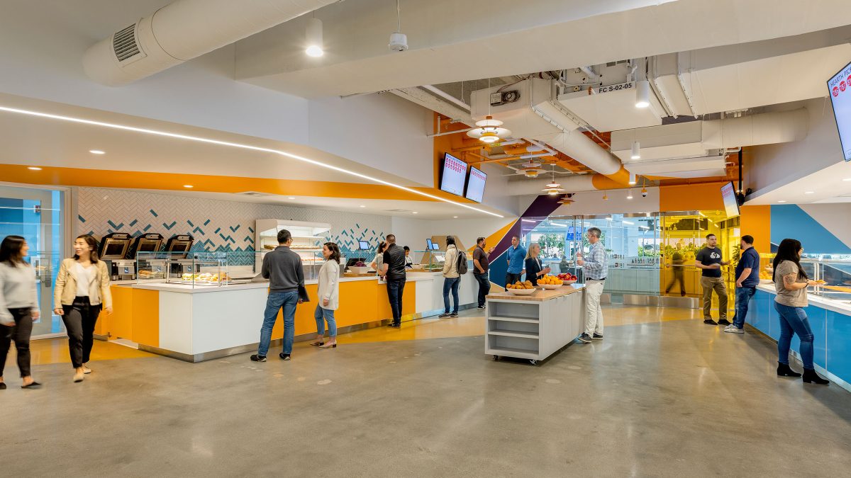 Ample circulation space of digital order boards alleviate pinch points through the various servery stations where fresh, seasonal, healthy food is made to order.